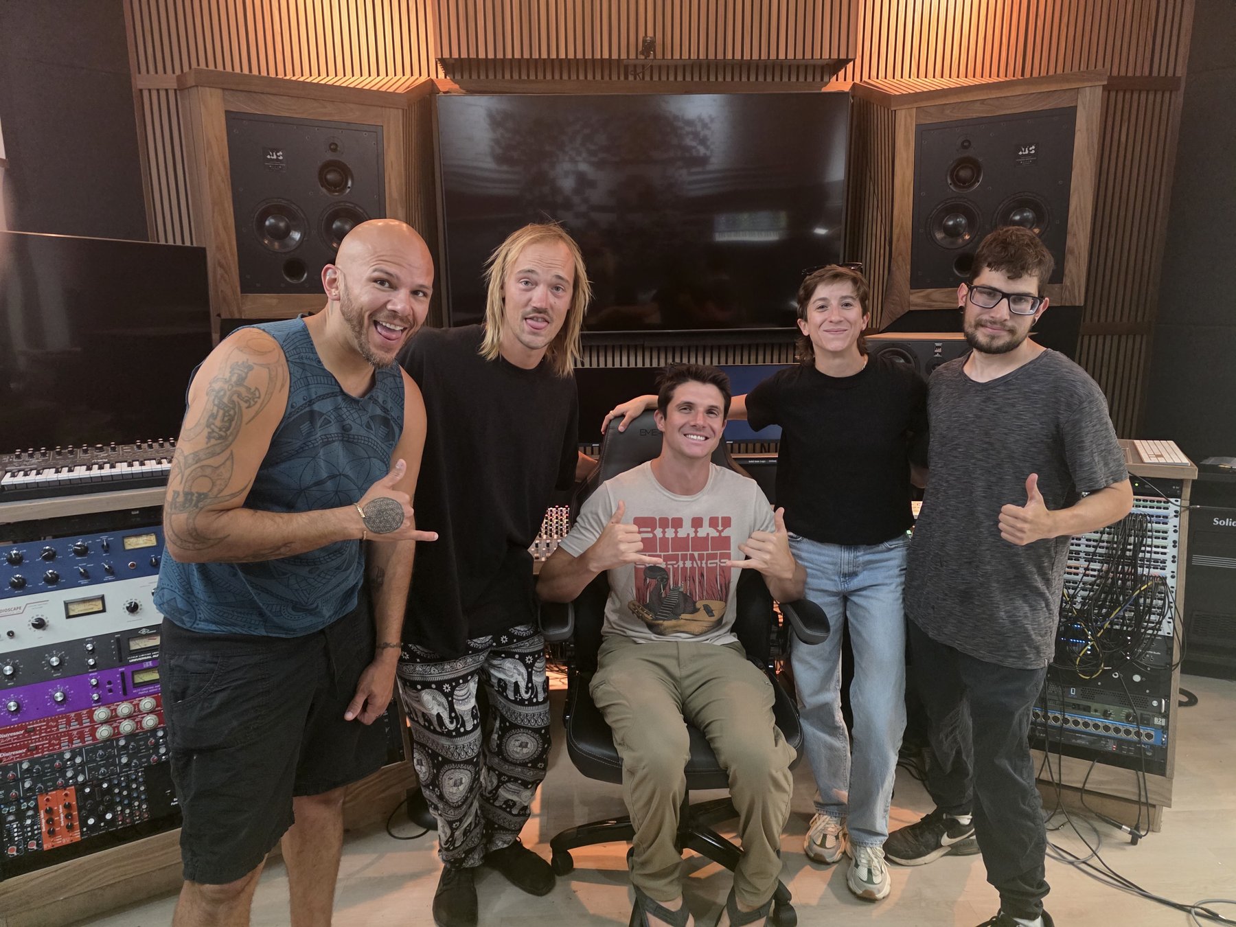 Derek and the DRMA crew together in the recording studio control room